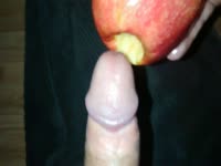 Recently divorced guy satisfies sexual urges by inserting his cock into apple with hole in center